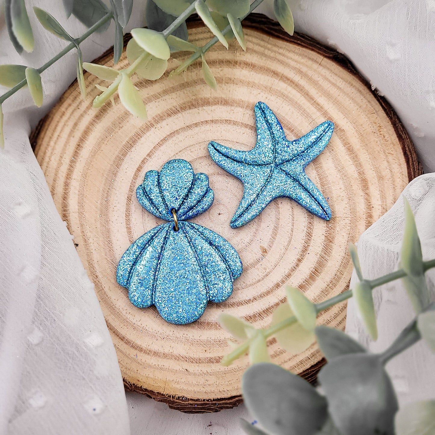Brincos Shelly | concha | estrela do mar | Glitter | polymer clay