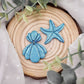 Brincos Shelly | concha | estrela do mar | Glitter | polymer clay