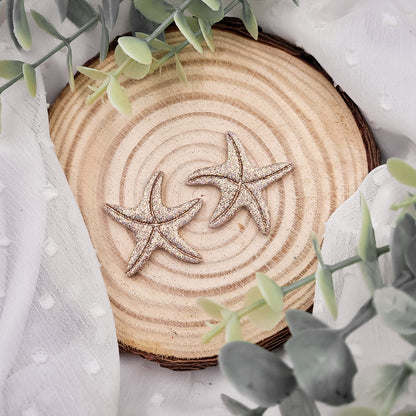Brincos Mia | estrelas do mar | glitter | polymer clay